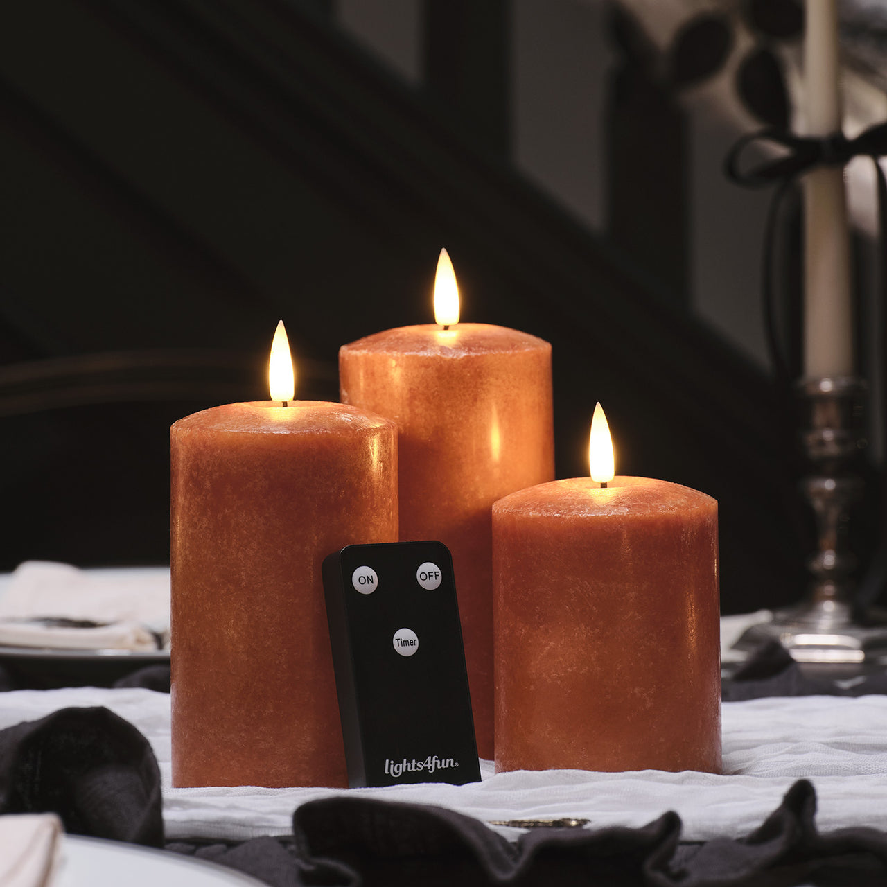 Lot de 3 Bougies Piliers TruGlow® à LED Orange Moucheté