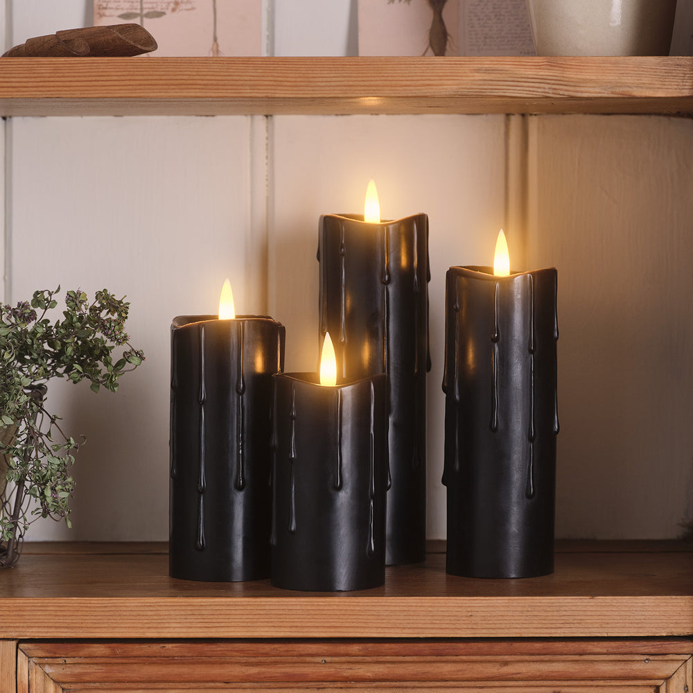 4 Bougies Piliers Fines TruGlow® en Cire Noire Coulante