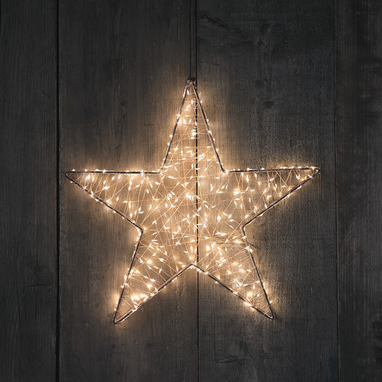 Silhouette Étoile Lumineuse en Cuivre à Micro LED