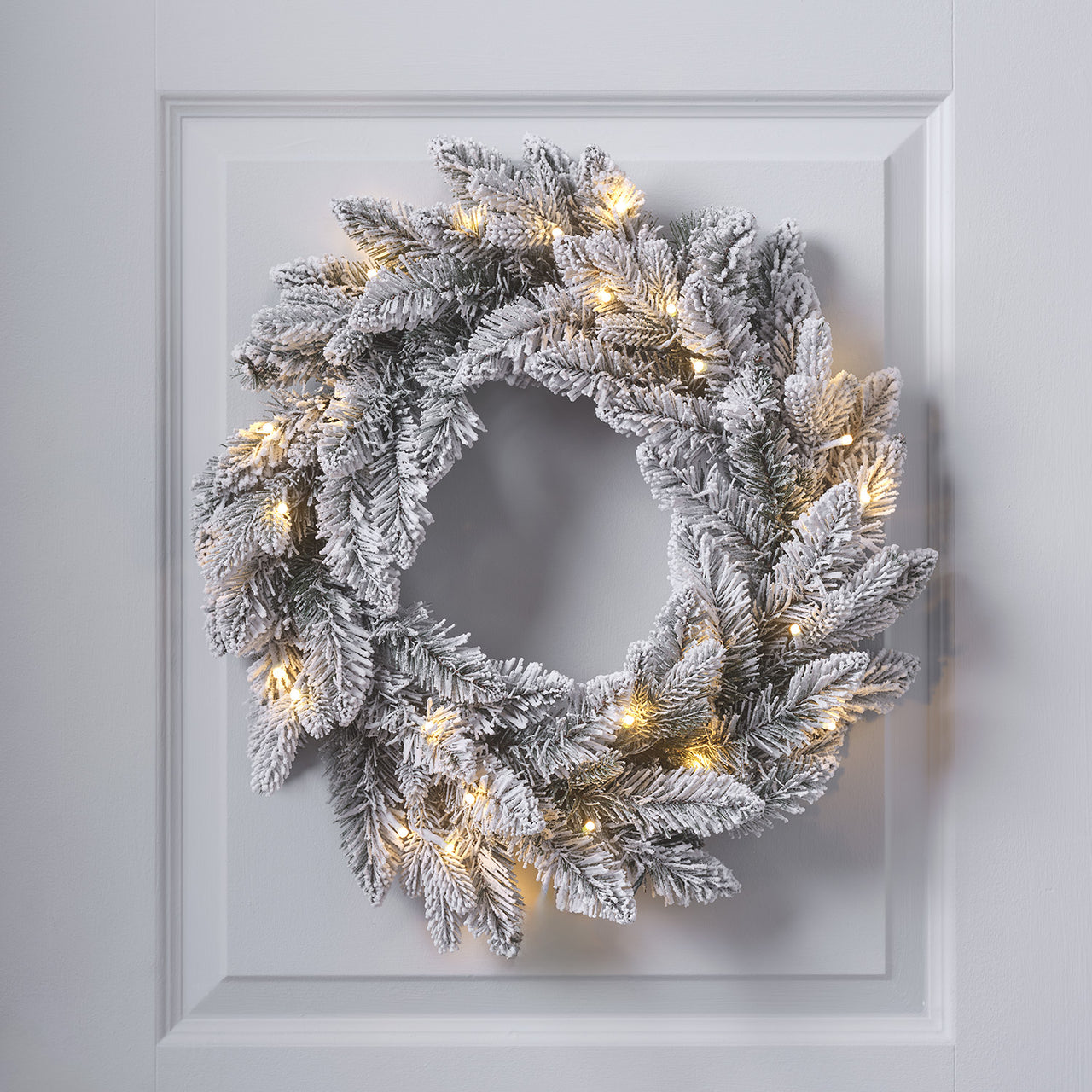 Lot Couronne & Guirlande de Noël Enneigées à LED Blanc Chaud