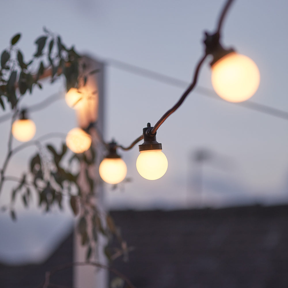 Guirlande Guinguette Pro Connect IP67, 10m 20 LED Blanc Chaud Câble Noir Raccordable