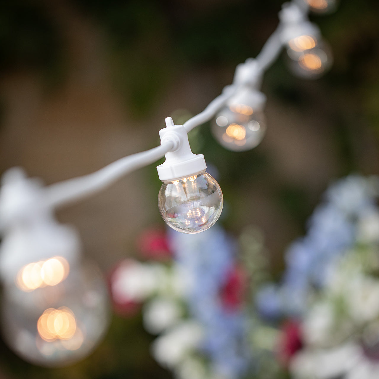 Guirlande Guinguette Pro Connect 55m 110 LED Blanc Chaud Câble Blanc Raccordable Ampoules Transparentes