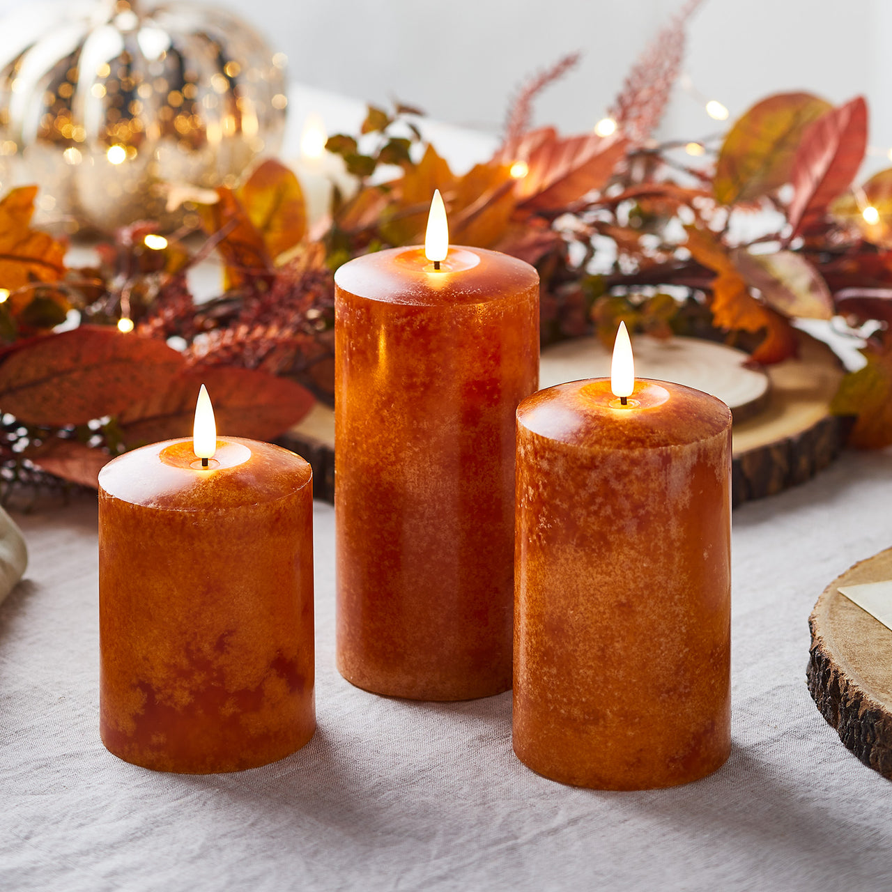 Lot de 3 Bougies Piliers TruGlow® à LED Orange Moucheté