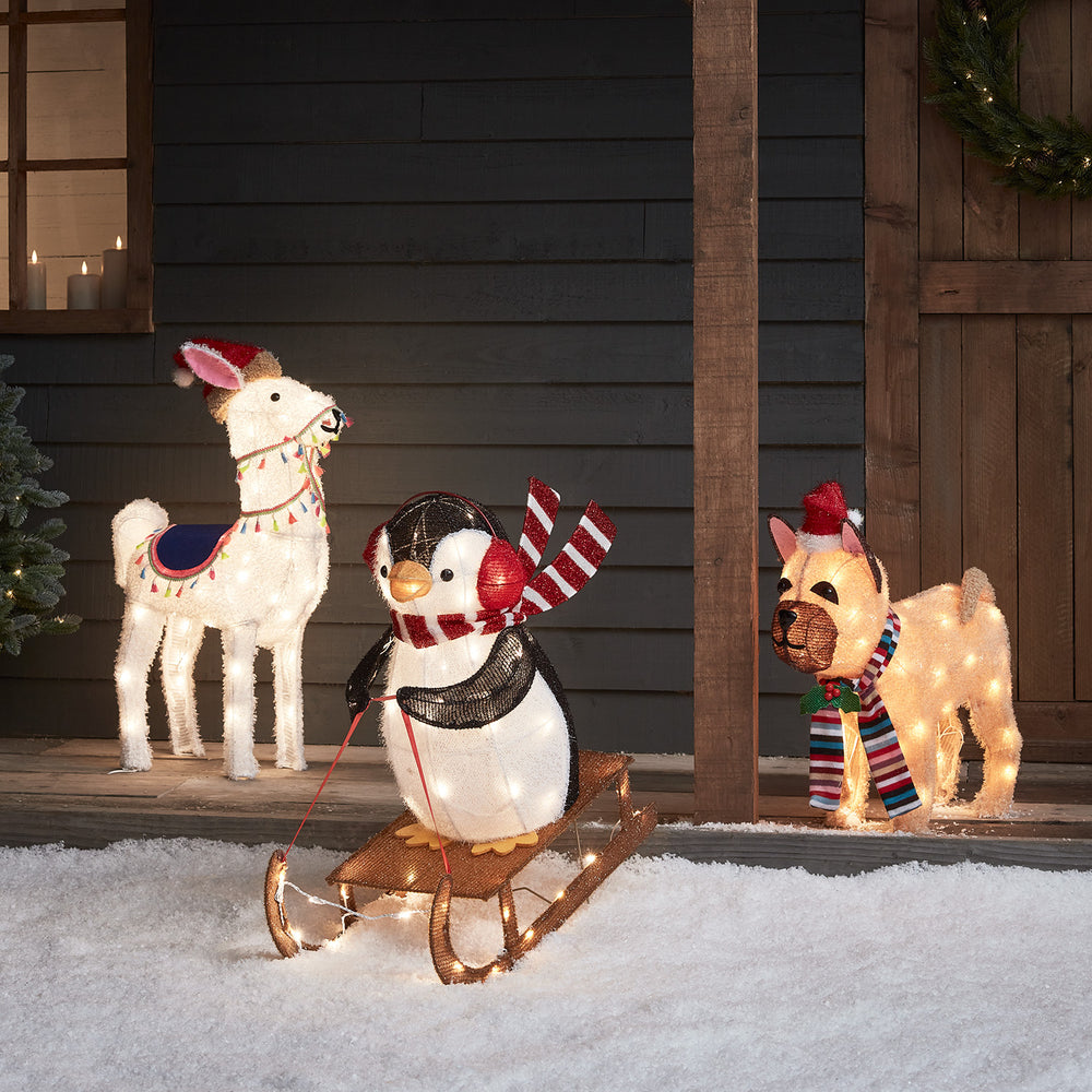 Figurines de Noël en forme d'Alpaga, Pingouin en Luge et Bouledogue