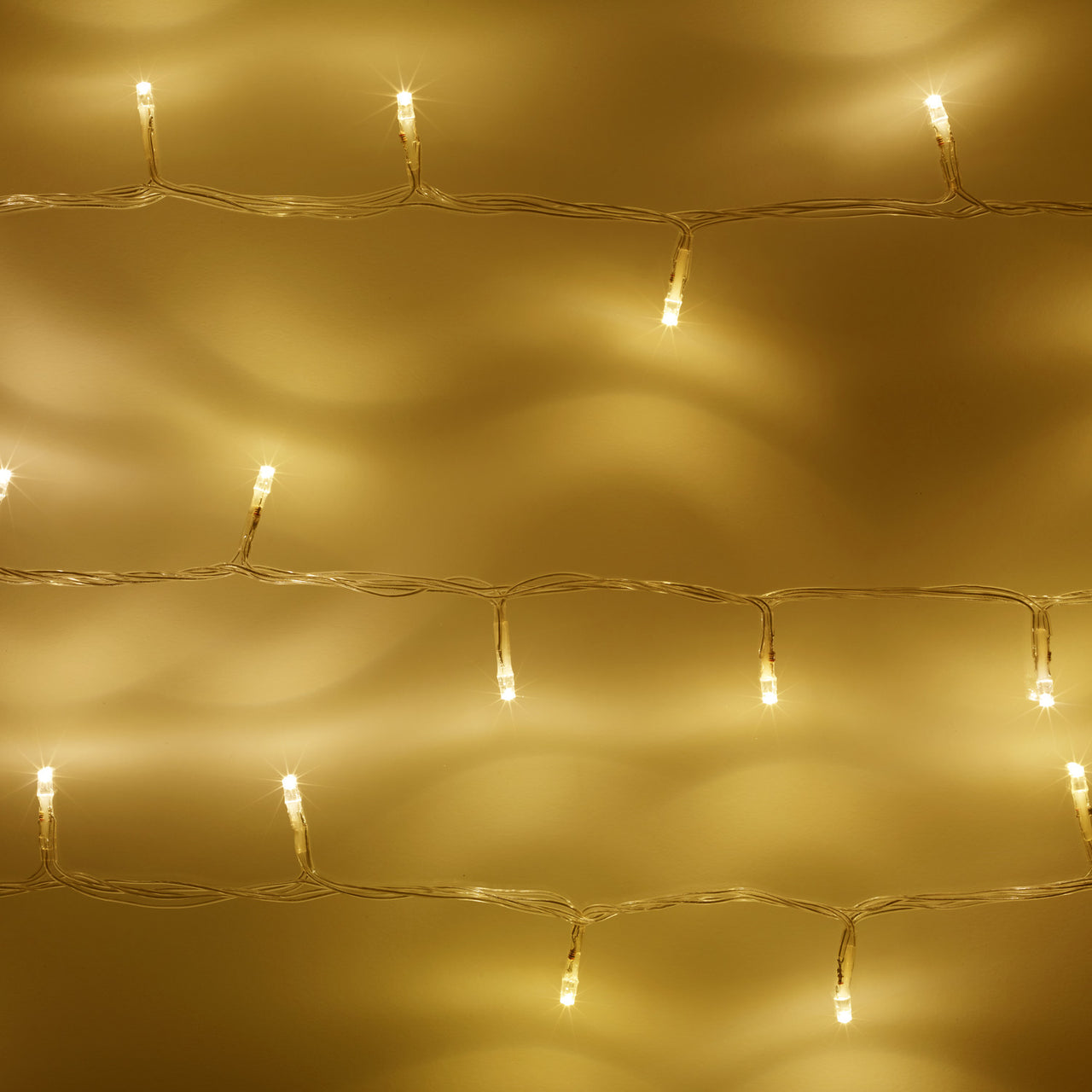 Guirlande Lumineuse à Piles 200 LED Blanc Chaud sur Câble Transparent