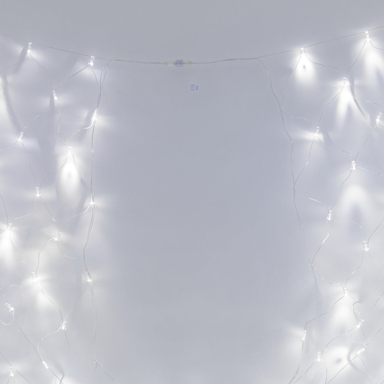 Filet Lumineux Raccordable 140 LED Blanches Câble Transparent 2 x 2m