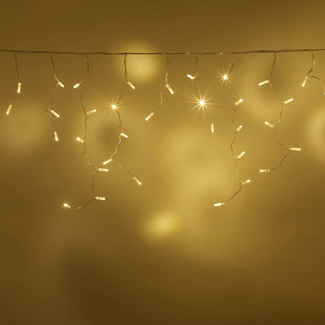 Guirlande Stalactite 22m 704 LED Blanc Chaud Câble Transparent Raccordable Série Cœur